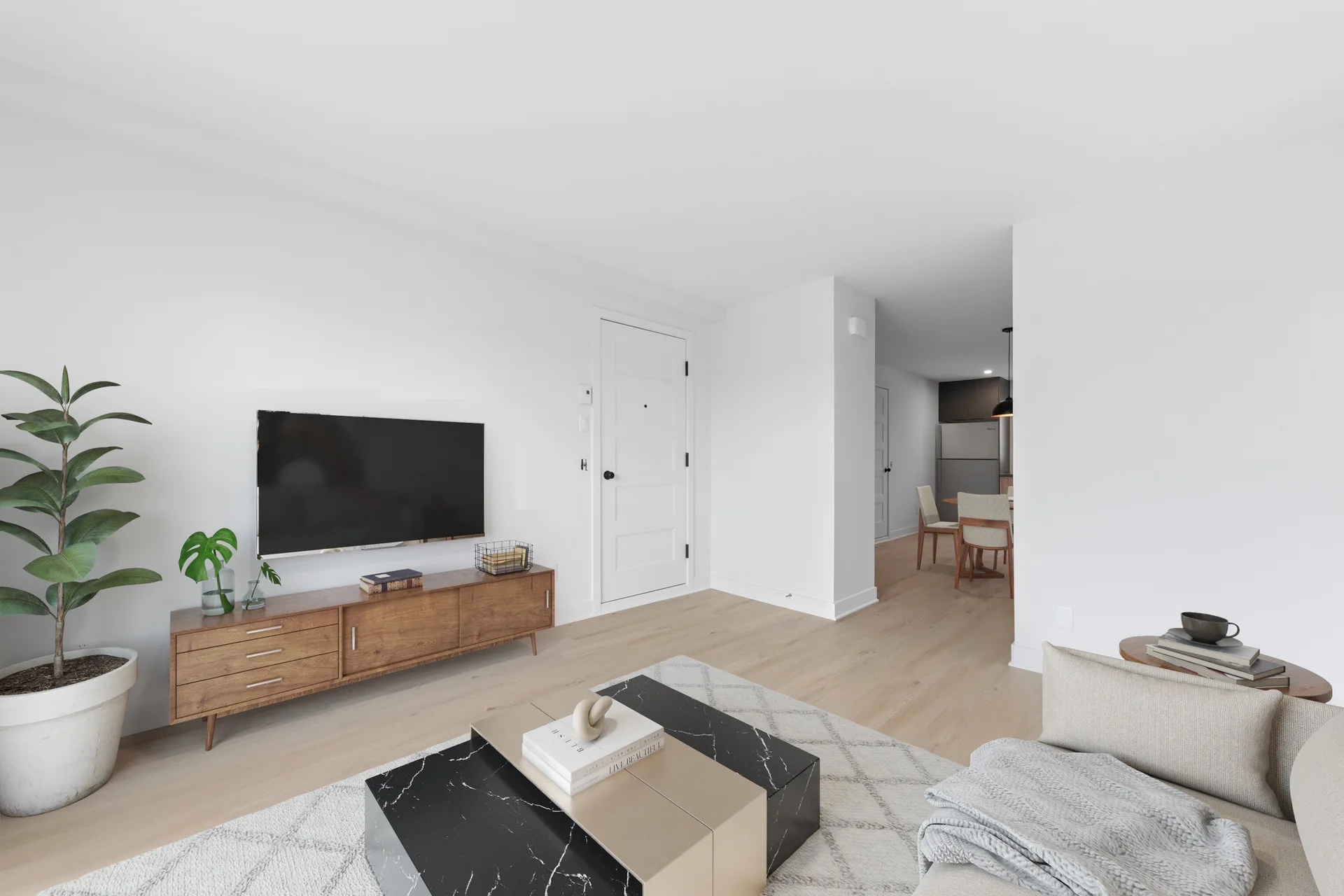 Le salon vu depuis l’autre extrémité, ouvert sur la salle à manger